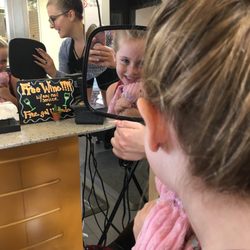 Huge smile after Camber pierced her ears. She was so proud and Camber treated her like family.
