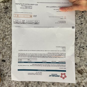 Atlas Construction - a hand holding a piece of paper - General Contractors Near Me - Solana Beach, California