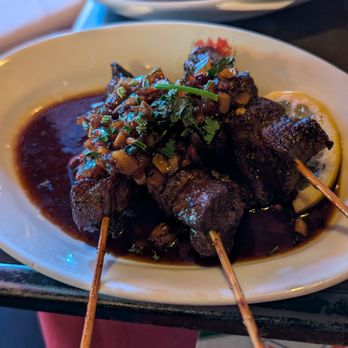 Sama Sebo - Young goat with spring onions (this was my favorite) - Indonesian Near Me - Amsterdam, New Hampshire Sama Sebo - Young goat with spring onions (this was my favorite) - Indonesian Near Me - Amsterdam, New Hampshire