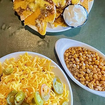 Lupie's Cafe - Top: Throw-Down Single-Layer Nachos Bottom: Chili Mac w/ Jalapeo, Corn - American Near Me - Charlotte, North Carolina Lupie's Cafe - Top: Throw-Down Single-Layer Nachos Bottom: Chili Mac w/ Jalapeo, Corn - American Near Me - Charlotte, North Carolina
