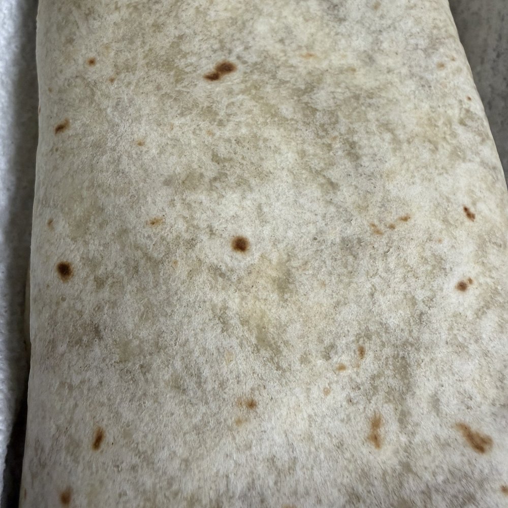 Bean and cheese burrito with store bought tortilla Bean and cheese burrito with store bought tortilla