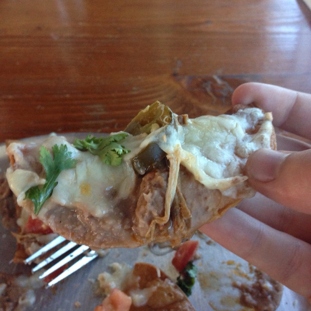 Sabertooth Food - Single chip of pork nachos - New American Near Me - El Paso, Texas Sabertooth Food - Single chip of pork nachos - New American Near Me - El Paso, Texas