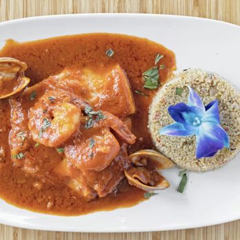 Stone House Grill - Pan-Seared Grouper-Served with shrimp, clams, garlic, white wine, marinara sauce, and quinoa. - Steakhouses Near Me - Mahopac, New York Stone House Grill - Pan-Seared Grouper-Served with shrimp, clams, garlic, white wine, marinara sauce, and quinoa. - Steakhouses Near Me - Mahopac, New York