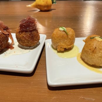 Restaurant R'evolution - Blue crab beignets and short rib boudin balls - Cajun/Creole Near Me - New Orleans, Louisiana Restaurant R'evolution - Blue crab beignets and short rib boudin balls - Cajun/Creole Near Me - New Orleans, Louisiana