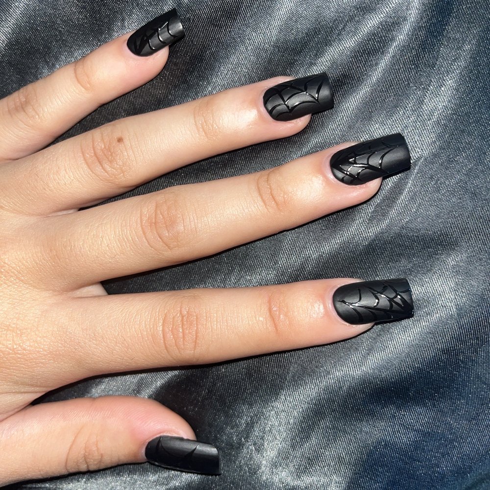 Gel X nails; Matte black base with spiderwebs Gel X nails; Matte black base with spiderwebs