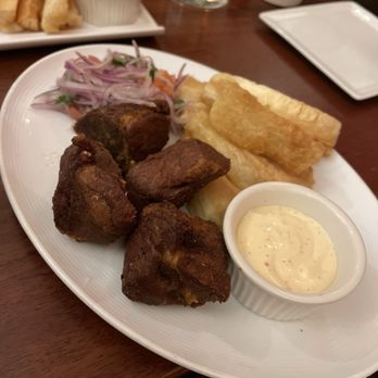 La Canela - Chicharrones de Cerdo - Peruvian Near Me - Rockville, Maryland La Canela - Chicharrones de Cerdo - Peruvian Near Me - Rockville, Maryland