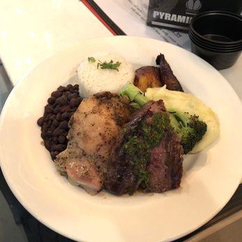 Artesano Peruvian Fusion - Our dual entree plate with Chicken Artesano and Chimichurri steak - Latin American Near Me - San Francisco, California