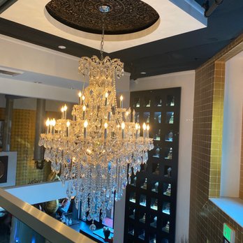 Panvimarn Thai Cuisine - View of the chandelier from the upstairs dining room - Thai Near Me - Long Beach, California Panvimarn Thai Cuisine - View of the chandelier from the upstairs dining room - Thai Near Me - Long Beach, California