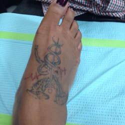 Outlaw Custom Tattoo - Tat I got in gulf shores in the middle August 2014 which faded away by the beginning of September -_-