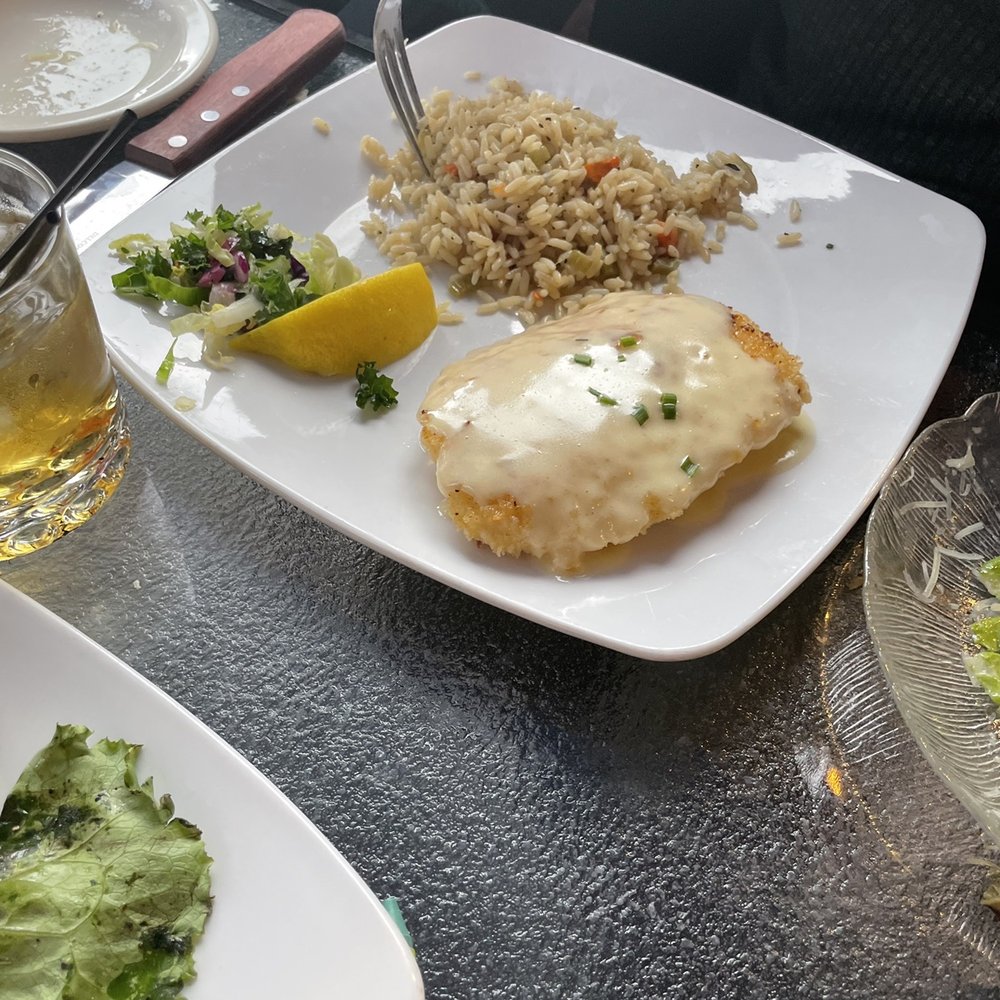 Sandpiper Restaurant & Lounge - Macadamia nut crusted halibut w/ rice pilaf - Seafood Near Me - Pocatello, Idaho Sandpiper Restaurant & Lounge - Macadamia nut crusted halibut w/ rice pilaf - Seafood Near Me - Pocatello, Idaho