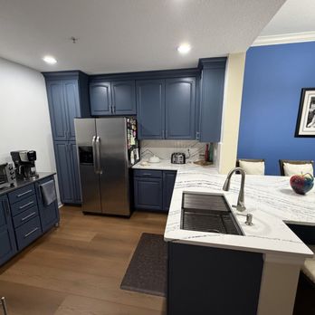 Carpet One Floor & Home of Central Florida - Open kitchen with updated pantry, larger cabinets and open countertop/table. - Carpeting Near Me - Celebration, Florida