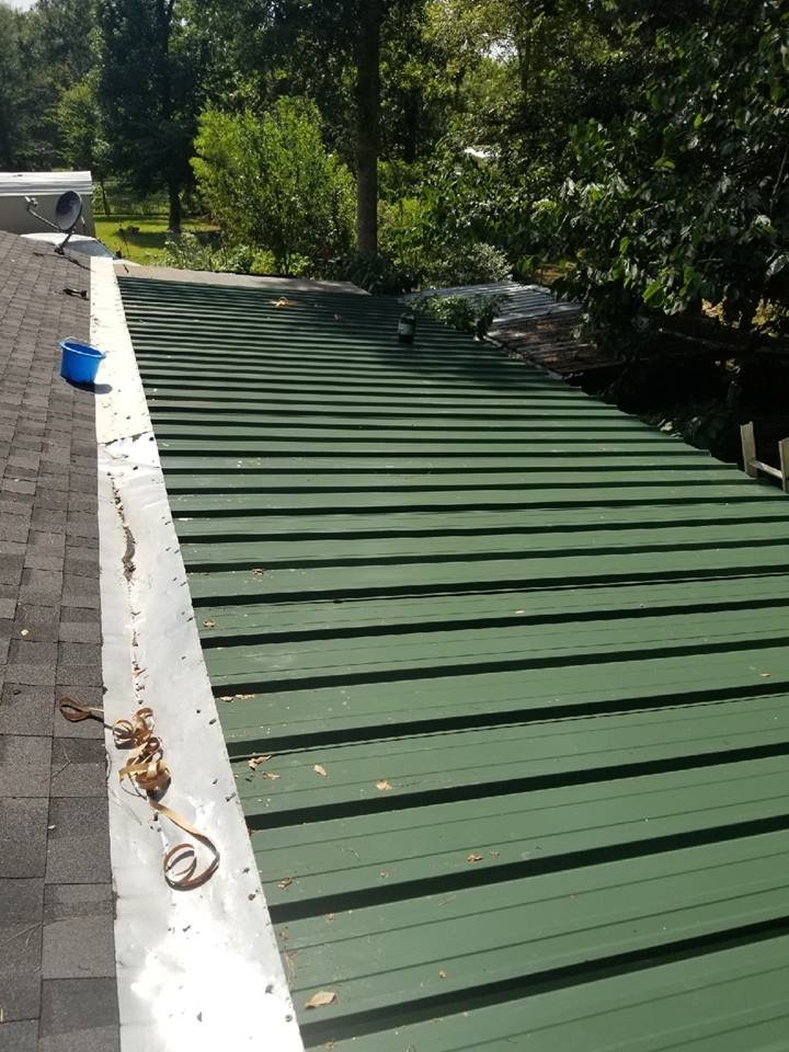 Slide of Hired Guns Roofing & Restoration