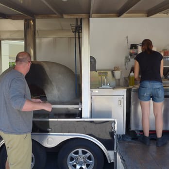 Stella Fiore Wood Fired Pizza - The pizza cook and 2 of his 4 assistants. - Pizza Near Me Stella Fiore Wood Fired Pizza - The pizza cook and 2 of his 4 assistants. - Pizza Near Me