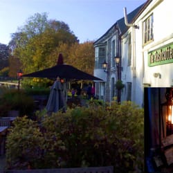 The Rushcutters - A roaring log fire in the grate in winter with wonderful river views at the rear.