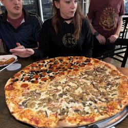 Abruzzo's Pizza at Carolina Forest - 26" pizza pie.  Fed 11 people!
