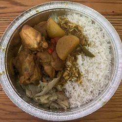 Happy Feet Caribbean Cuisine - Curry Chicken with white rice and steamed cabbage