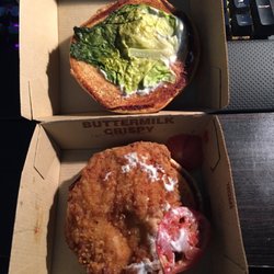 McDonald's - Buttermilk Chicken-Crispy Sandwich. A thin dark green almost grey looking piece of lettuce, barely any tomatoes, and dry chicken.