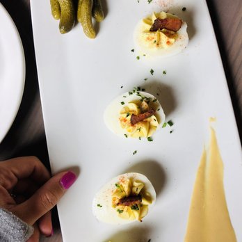 Third Street Social - Deviled Eggs w/ cornichon pickles, & nueske's bacon - Bars Near Me - Lee's Summit, Missouri Third Street Social - Deviled Eggs w/ cornichon pickles, & nueske's bacon - Bars Near Me - Lee's Summit, Missouri