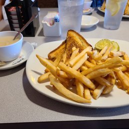 Grilled cheese sandwich, with chicken rice soup. The turkey club is in the background.