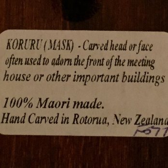 Te Puia - Sticker on the mask guaranteeing authenticity - Museums Near Me - Rotorua, BOP