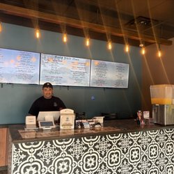 Lugo's Menu and owner