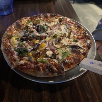 The Wolf Den Bar and Grill - Veggie pizza. Loaded up with toppings. - Bars Near Me - Reno, Nevada