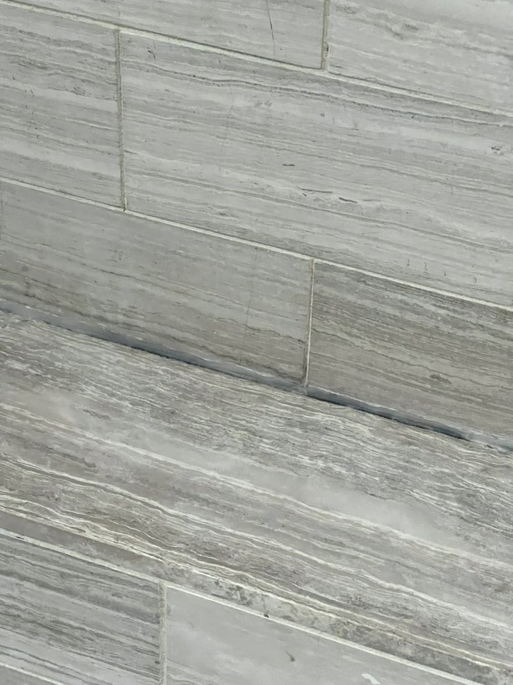 Slide of Pro Bath & Shower Caulking