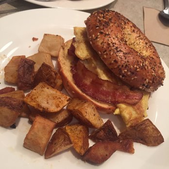 The Paramount - Bacon, egg, cheese bagel with potatoes - Breakfast & Brunch Near Me - Boston, Massachusetts
