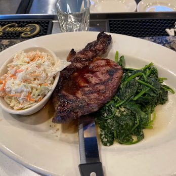 Hudson Grille - Ribeye, spinach and coleslaw - Sports Bars Near Me - Sandy Springs, Georgia
