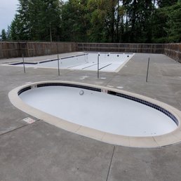 Freshly poured concrete swimming pool deck by S&W Freshly poured concrete swimming pool deck by S&W