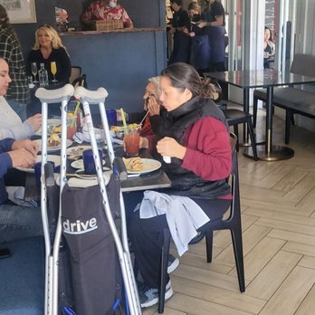 The Attic - that guy in the red at counter told mobil3 orders someone will help us been 20mins - Breakfast & Brunch Near Me - Long Beach, California