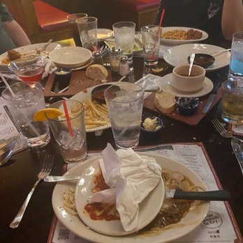 The Old Spaghetti Factory - Our table at the end of the meal, no refills, never took any of the old Plates. - Italian Near Me - Phoenix, Arizona The Old Spaghetti Factory - Our table at the end of the meal, no refills, never took any of the old Plates. - Italian Near Me - Phoenix, Arizona