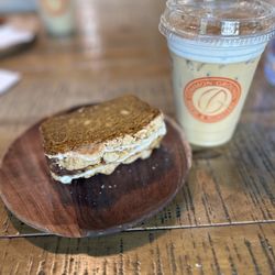Common Grounds Brew & Roastery - Pumpkin streusel bread and an iced oat milk latte with pumpkin cold foam~