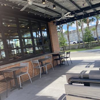 Raising Cane’s - Outside patio - Chicken Shop Near Me - Royal Palm Beach, Florida Raising Cane’s - Outside patio - Chicken Shop Near Me - Royal Palm Beach, Florida