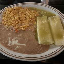 Kandela Mexican Grill - My onion and cheese Enchiladas Dinner with verde sauce on top (sides of beans and rice)