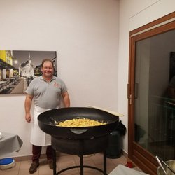 SAS Le Birdie - Tartiflette and the chef that serves it.