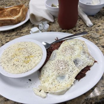 Ally's Comfort Cafe - I added the pepper. Perfect grits, over medium eggs on home made corned beef hash - Diners Near Me - Davie, Florida Ally's Comfort Cafe - I added the pepper. Perfect grits, over medium eggs on home made corned beef hash - Diners Near Me - Davie, Florida