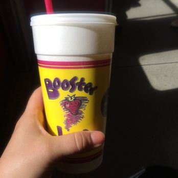 Booster Juice - a hand holding a cup with a straw - Juice Bars & Smoothies Near Me - Vancouver, British Columbia Booster Juice - a hand holding a cup with a straw - Juice Bars & Smoothies Near Me - Vancouver, British Columbia