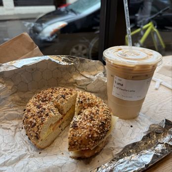 Pavement Coffeehouse - Sunrise Bagel Sandwich, Iced Vanilla Latte - Coffee & Tea Near Me - Boston, Massachusetts Pavement Coffeehouse - Sunrise Bagel Sandwich, Iced Vanilla Latte - Coffee & Tea Near Me - Boston, Massachusetts