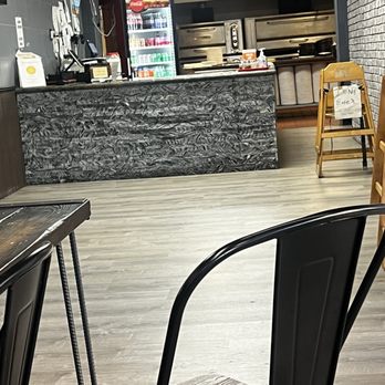 Singas Famous Pizza - the interior of a restaurant - Pizza Near Me - Jersey City, New Jersey Singas Famous Pizza - the interior of a restaurant - Pizza Near Me - Jersey City, New Jersey