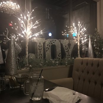 Ivy on the Square - Some of the Christmas decorations in the window. - Southern Near Me - Ocala, Florida