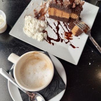 The Ridley House - Peanut Butter Chocolate Cake and Whipped Cream with Latte - Bars Near Me - Holmes, Pennsylvania