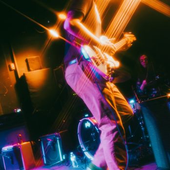 The Pyramid Scheme - guitarist on stage - Bars Near Me - Grand Rapids, Michigan