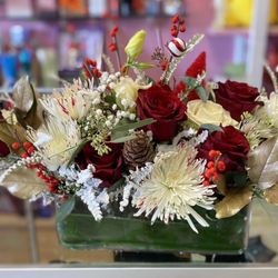 Custom floral arrangement for Mom's Christmas Eve dinner centerpiece. Gorgeous! Flower Arranging Genius!