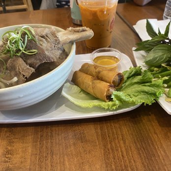 District 9 Kitchen - Rib bone pho, egg rolls, and iced Thai tea - Noodles Near Me - Anaheim, California District 9 Kitchen - Rib bone pho, egg rolls, and iced Thai tea - Noodles Near Me - Anaheim, California