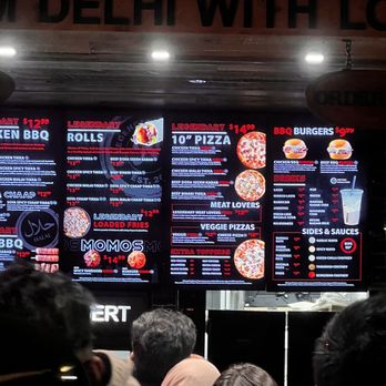 Nawab's Legendary - a crowd of people standing in front of a menu - Barbeque Near Me - Mississauga, Ontario Nawab's Legendary - a crowd of people standing in front of a menu - Barbeque Near Me - Mississauga, Ontario