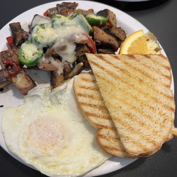 Cafe Stephanie - Potato tornado w/added jalapeños, eggs were cooked perfectly! - Sandwiches Near Me - Newport, Oregon Cafe Stephanie - Potato tornado w/added jalapeños, eggs were cooked perfectly! - Sandwiches Near Me - Newport, Oregon
