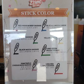 Zzang Hot Dog & Chicken - Different colors at the end of the sticks to allow customers to better identify the inner contents of their orders. - Korean Near Me - Oceanside, California Zzang Hot Dog & Chicken - Different colors at the end of the sticks to allow customers to better identify the inner contents of their orders. - Korean Near Me - Oceanside, California