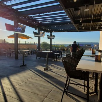 Topgolf - 3rd floor outdoor patio with a TON of space. - Sports Bars Near Me - Renton, Washington Topgolf - 3rd floor outdoor patio with a TON of space. - Sports Bars Near Me - Renton, Washington