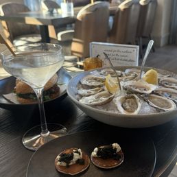 Dozen oysters Two bumps of caviar Dirty martini Chicken sandwich Dozen oysters Two bumps of caviar Dirty martini Chicken sandwich